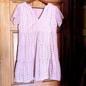 COPY - NWT. Never worn. This eyelet lace dress is ready to wear any time of the…